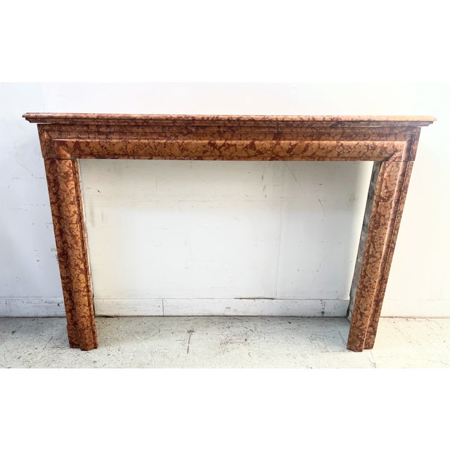 Large louis xiv style fireplace in speckled breccia marble border and jambs with rounded relief old restoration, see...