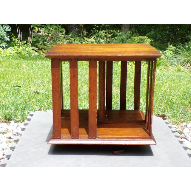Antique Mission Era Small Solid Oak Desktop Revolving Bookcase Vintage tabletop spinning bookcase, each side has 3 slats...