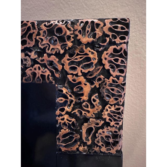 This black lacquerware tray is gorgeous! Has built-in handles and what looks to be sliced walnut sections along the top,...