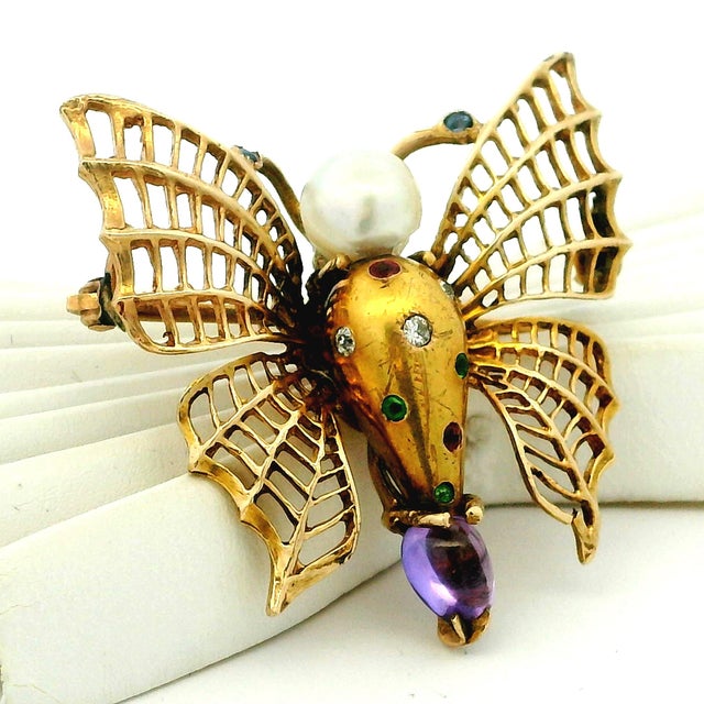 A wonderfully whimsical vintage figural bee brooch, crafted in 18 karat yellow gold with the playful sophistication...
