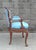 A vintage handmade arm chair in blue satin striped damask upholstery with gimp trim. This elegant side chair was hand made...