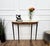 Very elegant and refined Italian 1950s Mid-Century Modern and neoclassical design console table. The four stunning carved...