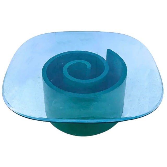 This mid-century modern vgreen snail form coffee table in the manner of Kagan for Selig. It dates to the 60s, and it is in...