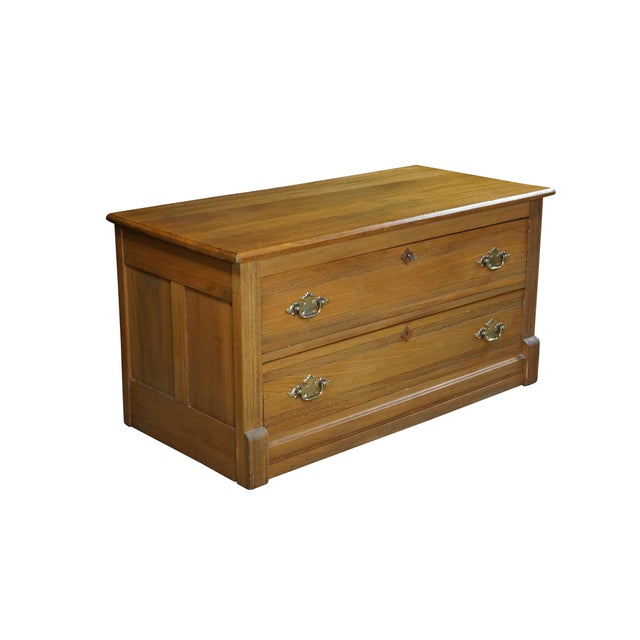 Antique Victorian era low-profile chest, circa 1880s. Features a double-drawer configuration crafted with a clean,...