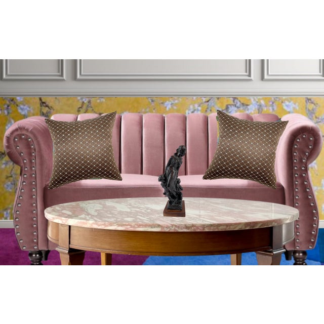 This evocative sculpture by Domenico Mazzone, created in 1983, stands at 14 inches tall and captures a deeply emotional...