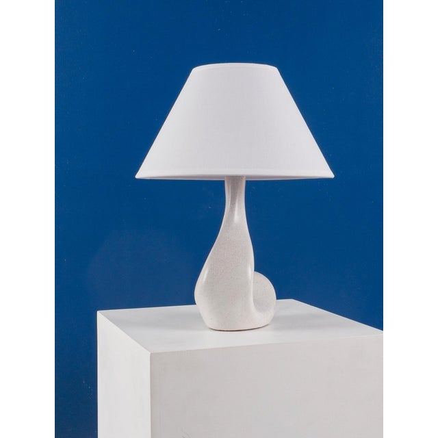 French work lamp france, circa 1950 ceramic h: 20 cm / w: 13 cm / d: 9 cm total height: 34 cm excellent overall condition....