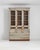 The unusual shape and evocative patina of this antique wooden vitrine makes it a find to treasure. Built in Portugal in...