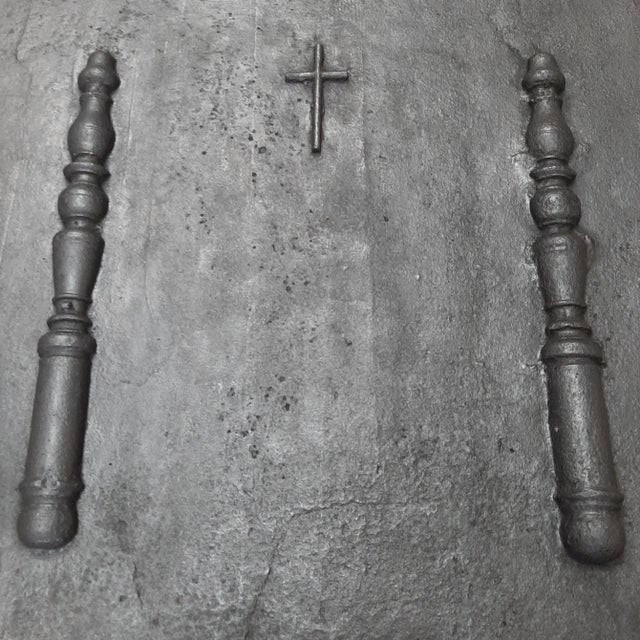 Antique fireplace back plate from the 17th century, this firestone is decorated with the columns of Hercules. These...