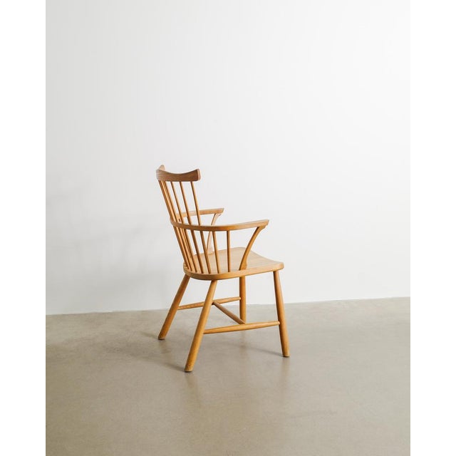 A rare danish mid century modern wooden high back windsor armchair in stained and sculptural oak by børge mogensen...
