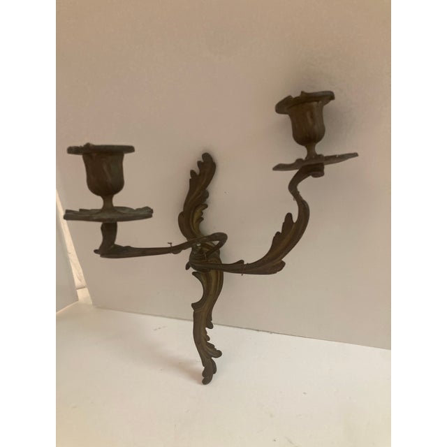 French Louis XV Bronze Candle wall sconces, never wired all original. Beautiful bronze work and very delicate. Leave as is...