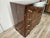 An elegant Italian dresser from the 1940s, a magnificent example of the Art Deco style characterized by geometric lines,...