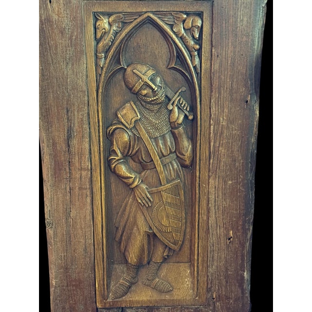 Gothic Revival Oak Panel with Knight Carving Late 19th-Early 20th Century (ca. 1880-1920) Hand-carved from solid oak, this...