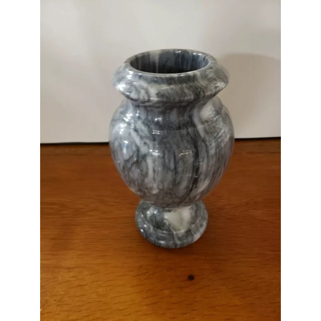 This is a Grey/White Marble Footed Baluster Vase. It measures 8" high and 5" wide. The piece is in excellent overall...