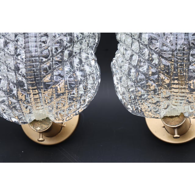 Stunning set of 2 Murano wall light by artist Ercole Barovier. The wall light consist of a glass leave and a newly...
