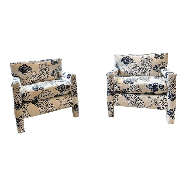 Here is a fabulous pair of vintage mid-century parsons chairs in the style of Milo Baughman. They have been reupholstered...