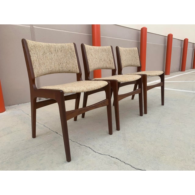 Beautiful set of three Danish modern style dining chairs made by D-Scan. Teak wood construction with handsome joinery...