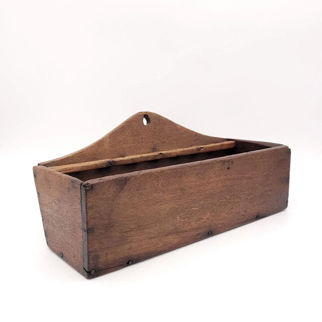 An oak candle box or spoon rack, England circa 1750.