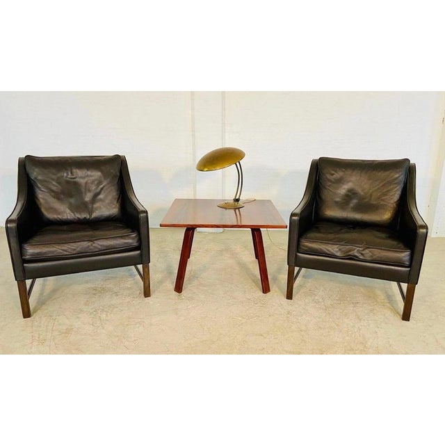 A superb pair of Scandinavian Mid-Century Modern lounge chairs attributed to renowned Norwegian designer Fredrik Kayser,...