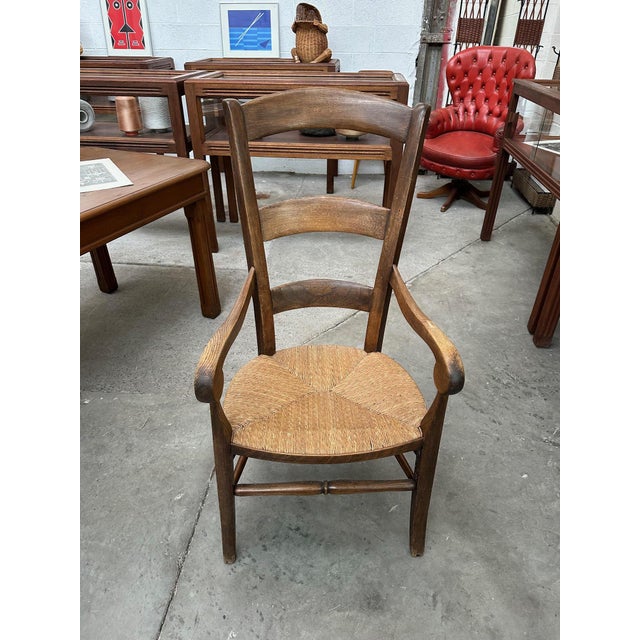 Country armchair in oak High backrest for extra comfort, straw seat in very good condition. Seat height 42 cm I have...