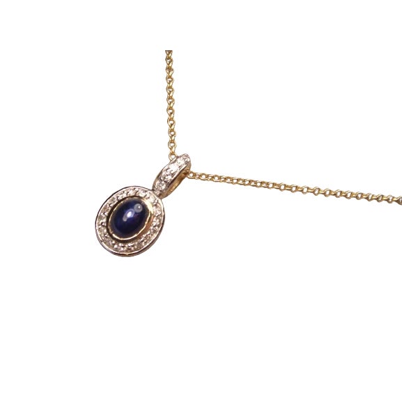 14K Yellow Gold Cabochon Sapphire Diamond Pendant Necklace. This elegant pendant features a natural 8mm x 6mm oval...