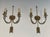 Pair of bronze wall sconces with Arrows and Effigy of the Sun King by Louis Gau