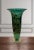 This striking 13.5-inch tall trumpet-shaped art glass vase, crafted by renowned Canadian glass artist Robert Held, is a...