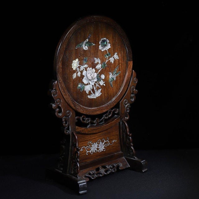 This is an exquisite, freestanding wooden table screen (or display stand) featuring intricate mother-of-pearl (nacre)...