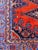 Expertly handknotted from pure wool, this magnificent Wiss rug exhibits exceptional artistry with a rich palette of...