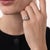 This beautiful Art Deco diamond engagement ring is a refined 1920’s design, centered by a GIA-certified cushion brilliant...