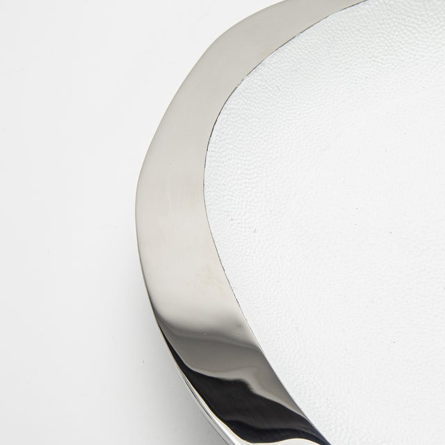 The White Shagreen & Stainless-Steel Lily Bowl L by R&Y Augousti is a stunning fusion of contemporary elegance and...