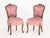 Pair of Victorian Style Walnut Slipper Chairs, with magenta silk blend upholstery and two lumbar cushions. 38" H x 19" W x...