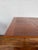 Solid teak dining table from circa 1960 Denmark. Measures 67“ X 35.25“ and 29“ tall. Leaves fold under to create card...