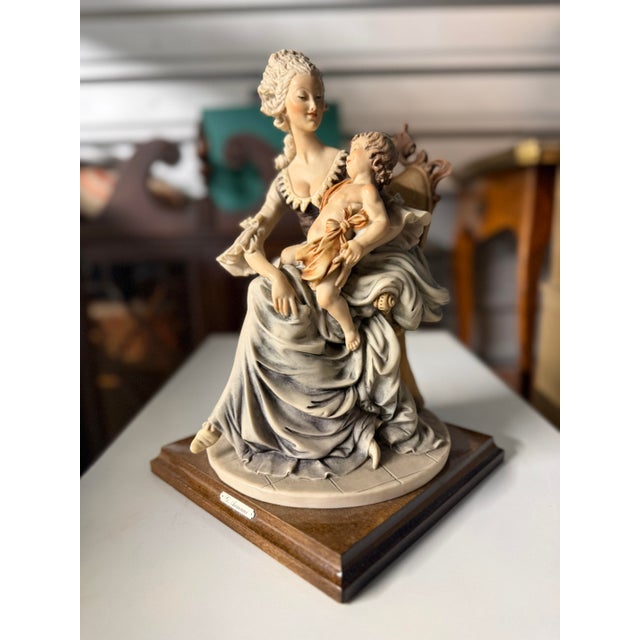 Plastic Late 20th Century Giuseppe Armani "Lady With Child" Figurine on a Wooden Base. For Sale - Image 7 of 10