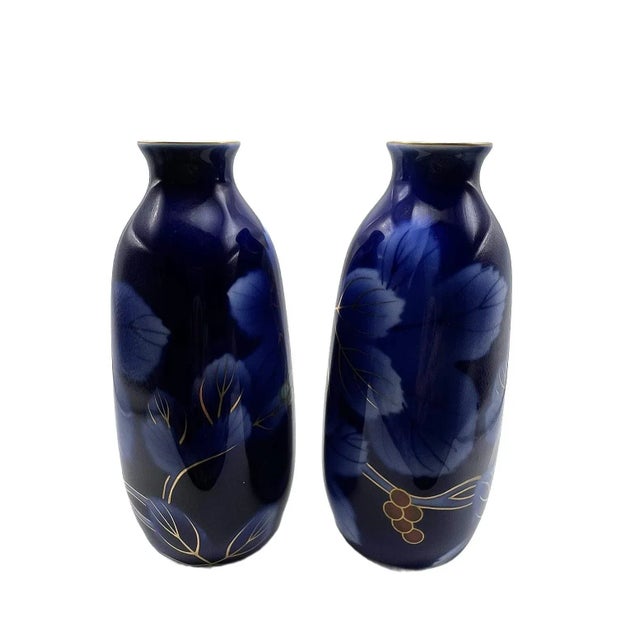 The beautiful and rich cobalt blue glaze is a signature glaze of the Fukagawa factory. Decorated on each bottle over the...