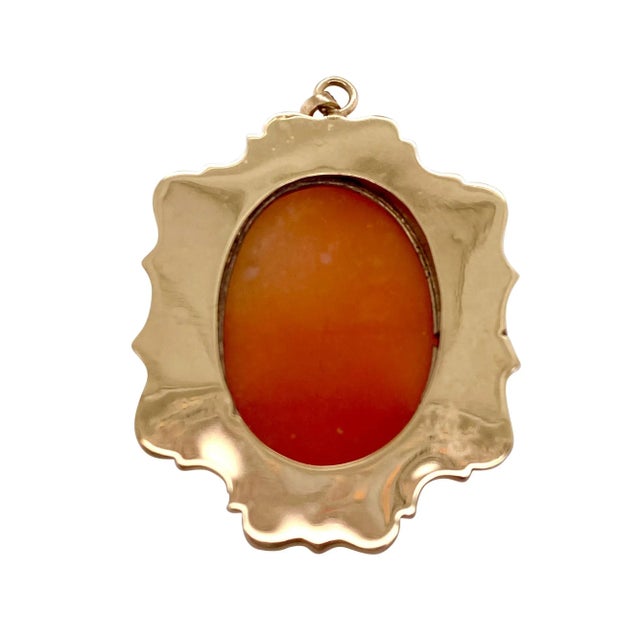 This is part of Chairish’s Fine Jewelry assortment. This is a wonderful 14K gold cameo, finely carved and dimensional. It...