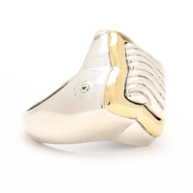 Ring Size 6.75 Rise off of Finger: 7.5 mm Length: 21.2 mm Weight: 7.1 dwts. / 11 grams Stamps: "DY 925 750" Quatrefoil...