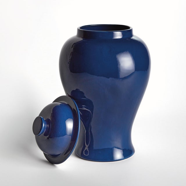 With a deep navy high gloss glaze, this lidded ginger jar is steeped in tradition. A perfect complement to the blue...
