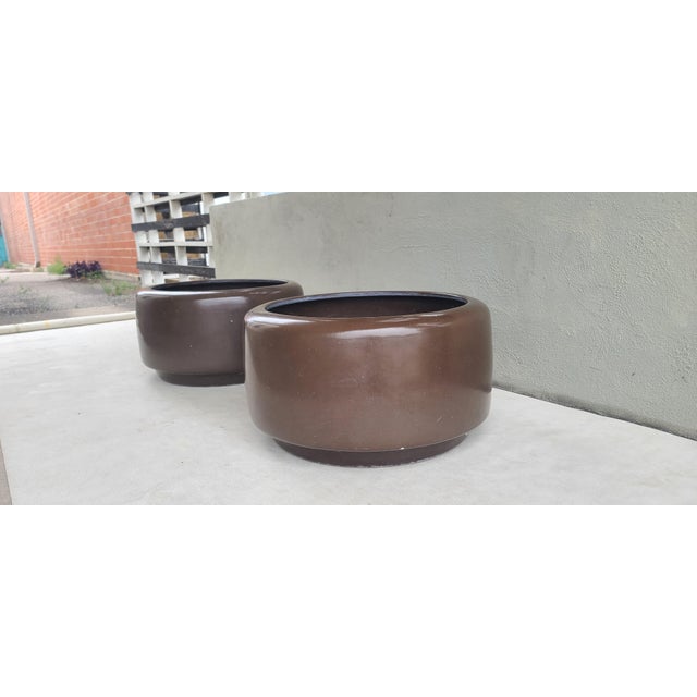 Large 26" Pottery Tire Planters by John Follis for Architectural Pottery. Original chocolate glazed finish in very good...