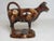 Brown glazed Staffordshire pottery cow creamer, c.1920’s Unusual in brown glaze, this cow creamer is well detailed and in...
