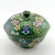 This vintage green Chinese cloisonné bowl with a beautiful floral enamel design is a unique and handmade piece that...