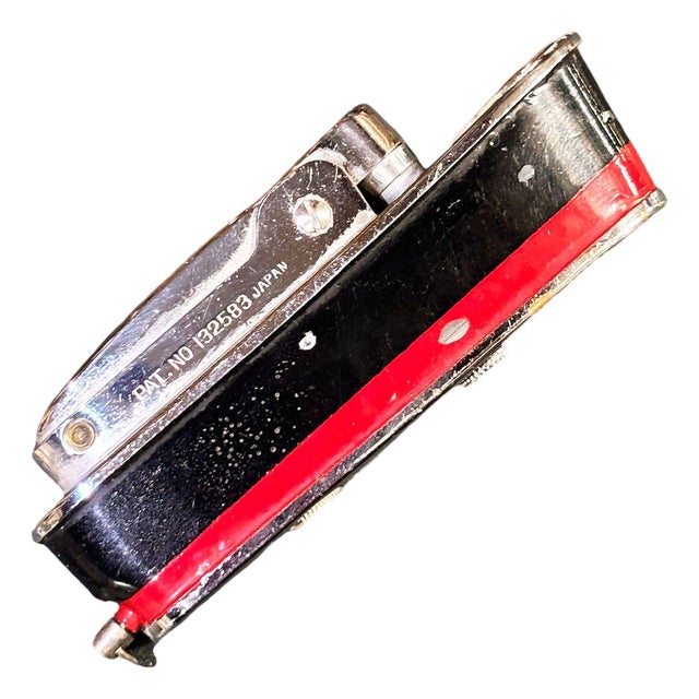 1960s MCM Novelty "Cruiser" Black & Red Cruise Ship Enameled Lighter by Sarome Japan For Sale