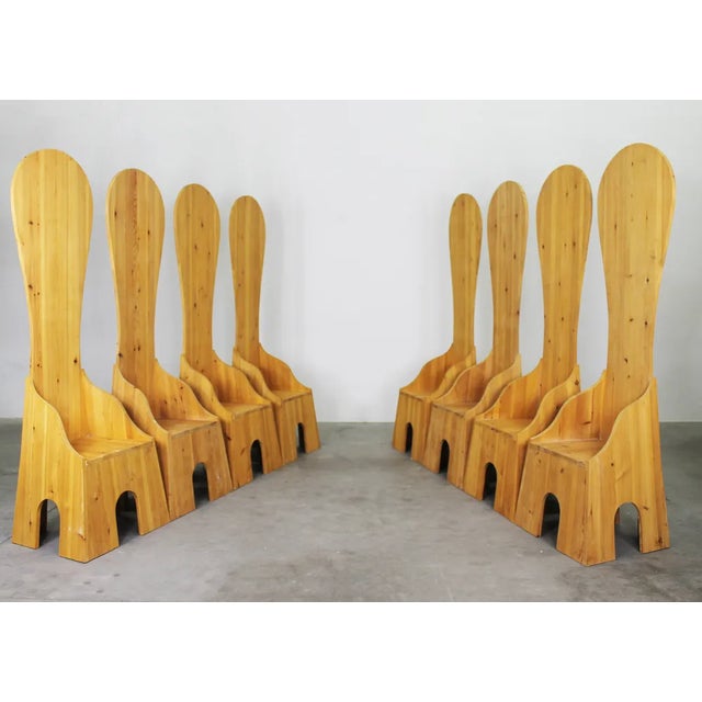 Set of eight Fratina chairs in pine wood designed by Mario Ceroli in 1972 and produced by Poltronova. Mario Ceroli showed...