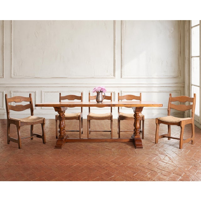 A rare set of six beautifully crafted oak and rush mid-century modern period brutalist dining chairs attributed to...