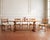 A rare set of six beautifully crafted oak and rush mid-century modern period brutalist dining chairs attributed to...