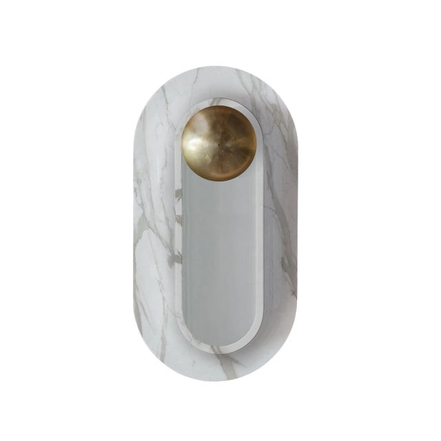Pfaffikon sconce by jan garncarek dimensions: d 12 x w 25 x h 46 cm material: brass, glass, carrara marble. Information:...
