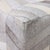 "A study in texture and precision, this handmade cowhide leather pouf introduces a more structured, geometric rhythm to...