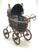 This vintage Victorian Style baby doll carriage is rare find! The carriage is made of wicker, wood and wrought iron. The...