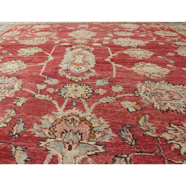 Early 20th Century Antique Turkish Oushak Rug in Red Blue/Gray Border L. Green Yellow & Pink For Sale - Image 4 of 11