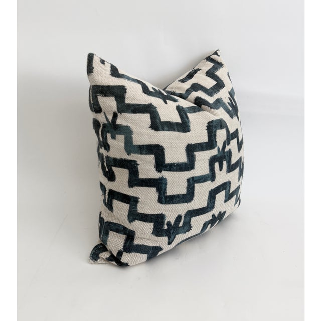 Custom pillow featuring 100% linen in the Tulu pattern with a feather/down insert and zipper closure. An indigo blue...