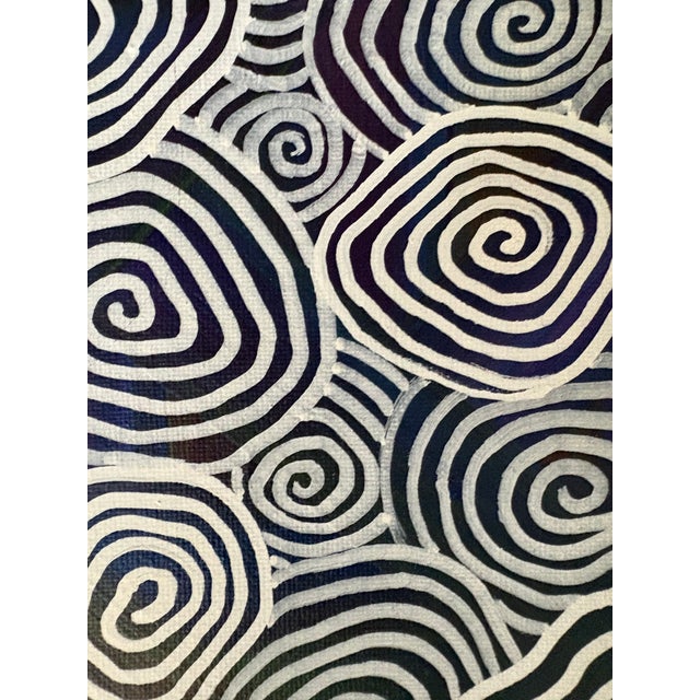 A signed painting done in a way that feels close to indigenous Aboriginal art. A tradition connected to Dreaming stories...